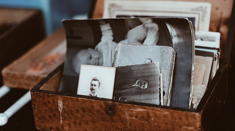 Old black and white photographs in a box