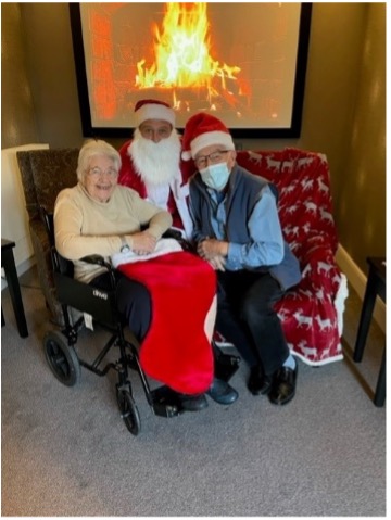 residents with santa on christmas