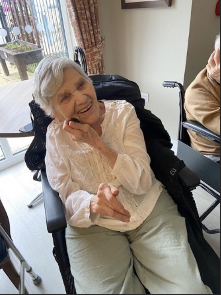 one of our residents with an animal from Safari Stu