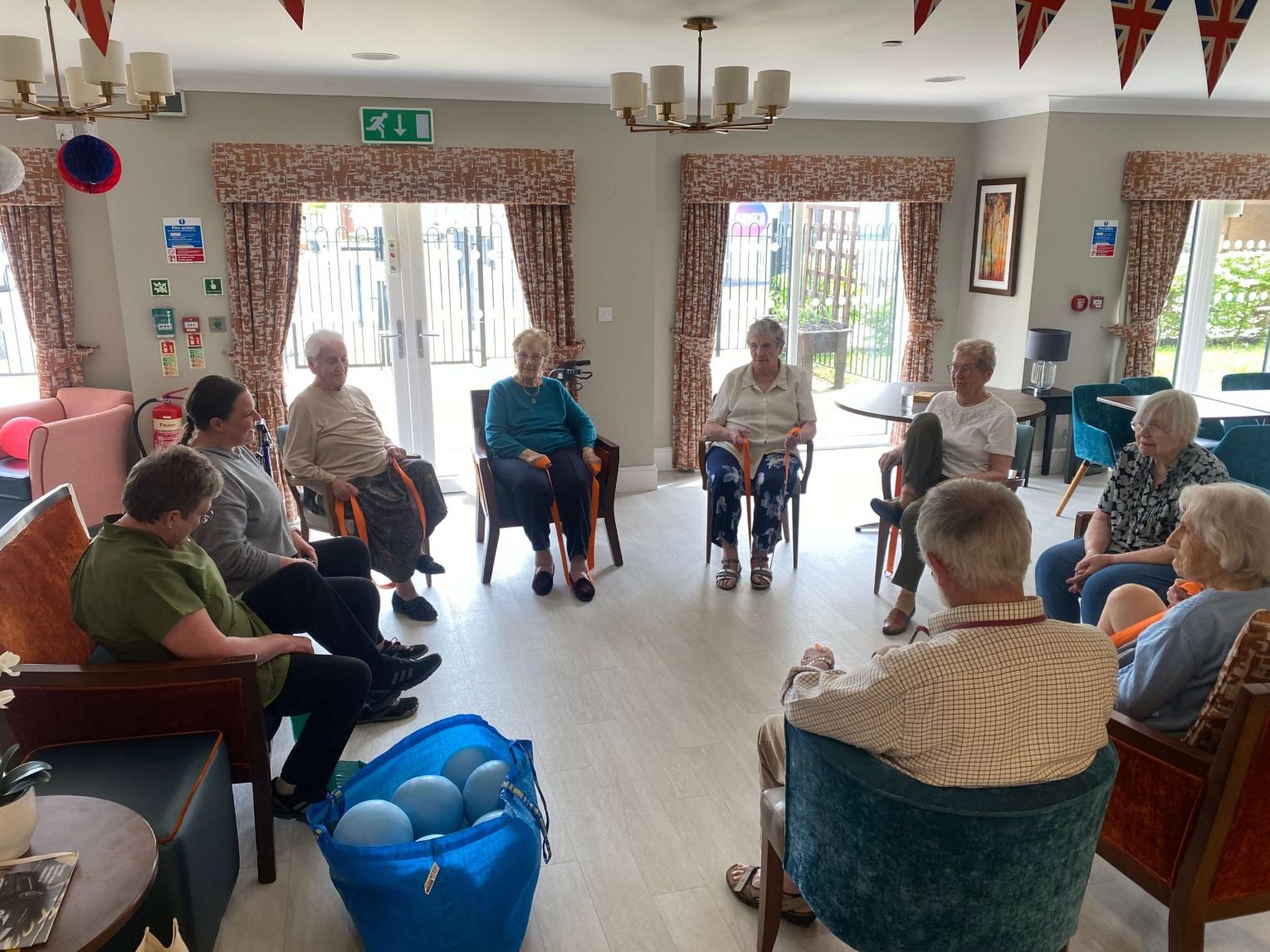 residents sat together on the coronation