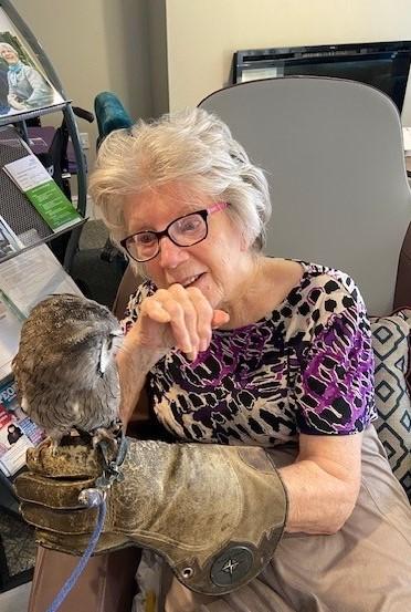 resident holding a bird