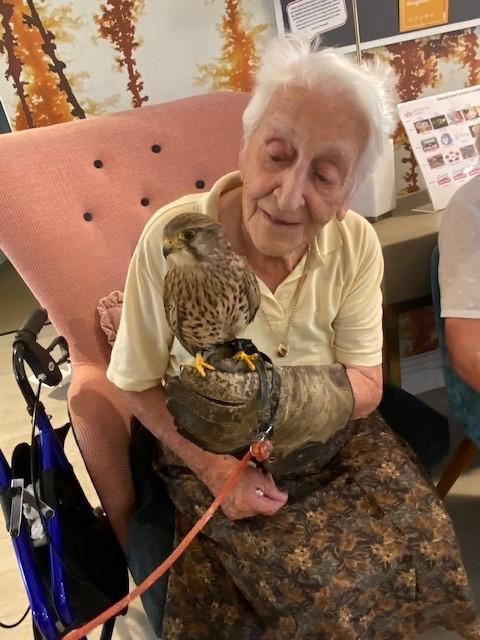 resident holding a bird