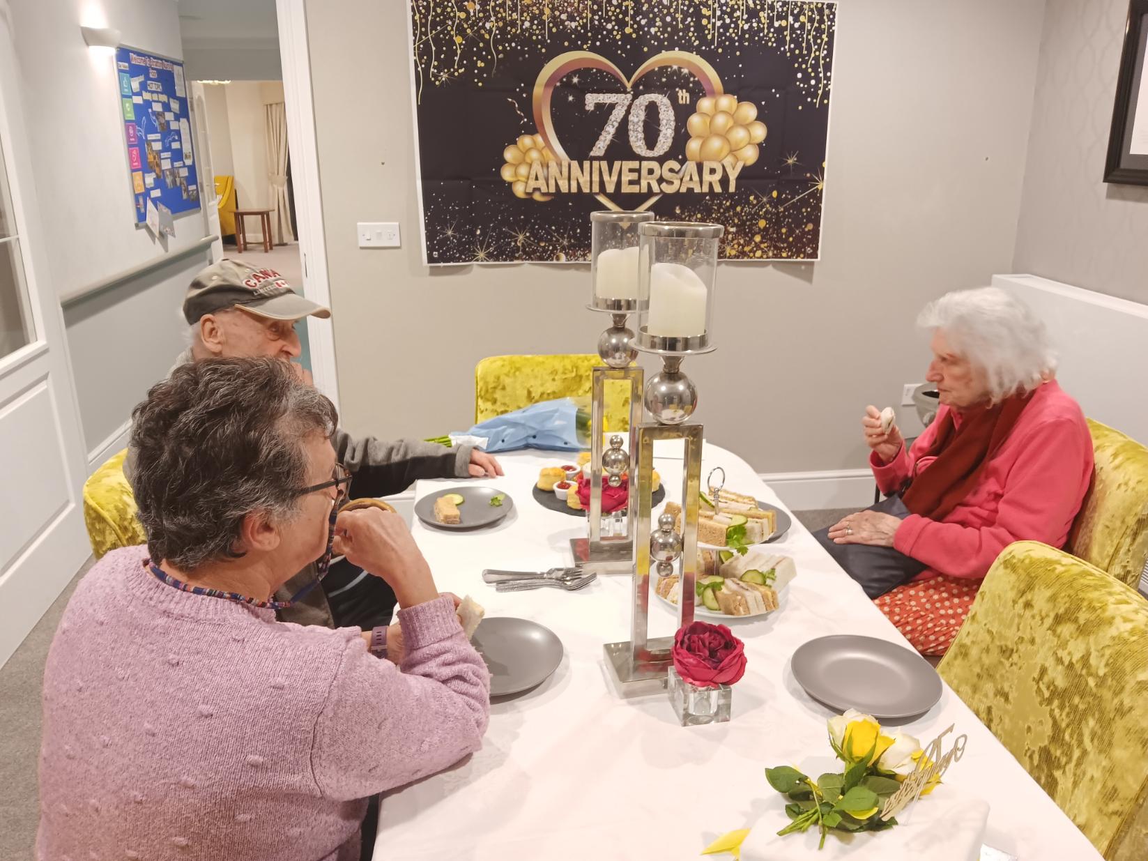 residents having afternoon tea with loved ones