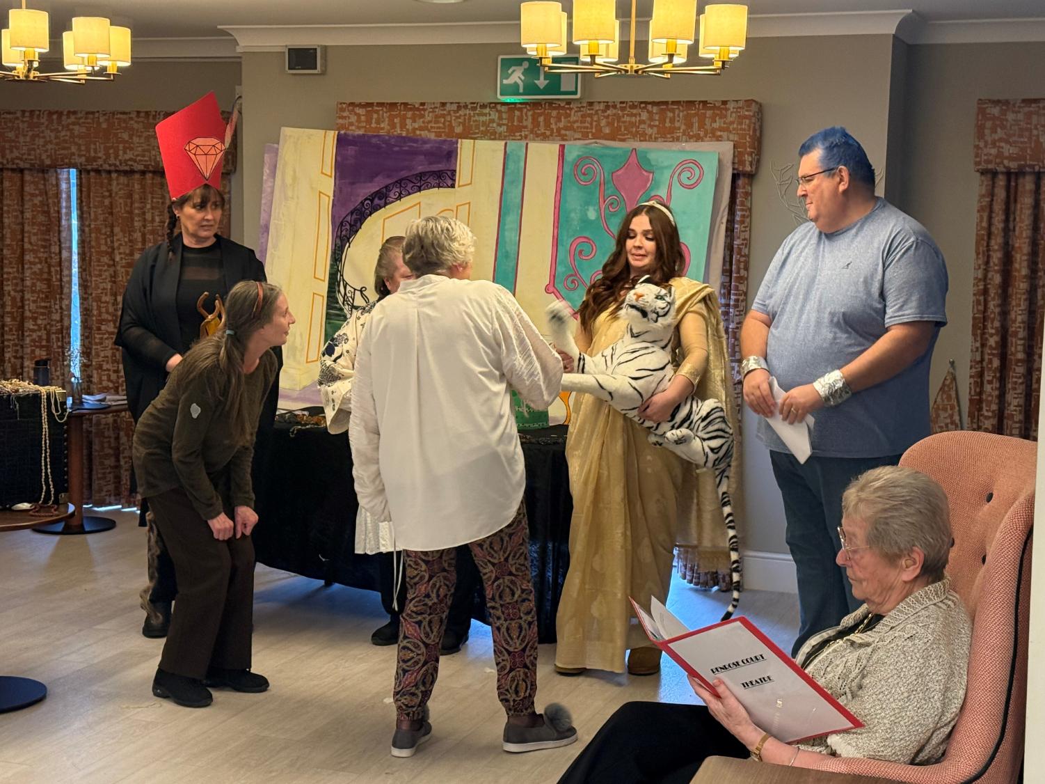 our team performing a pantomime for residents